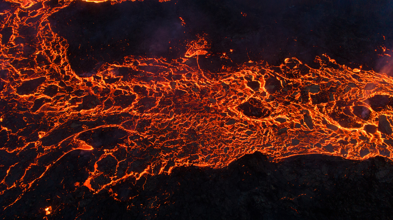 Lava Flowing at Night